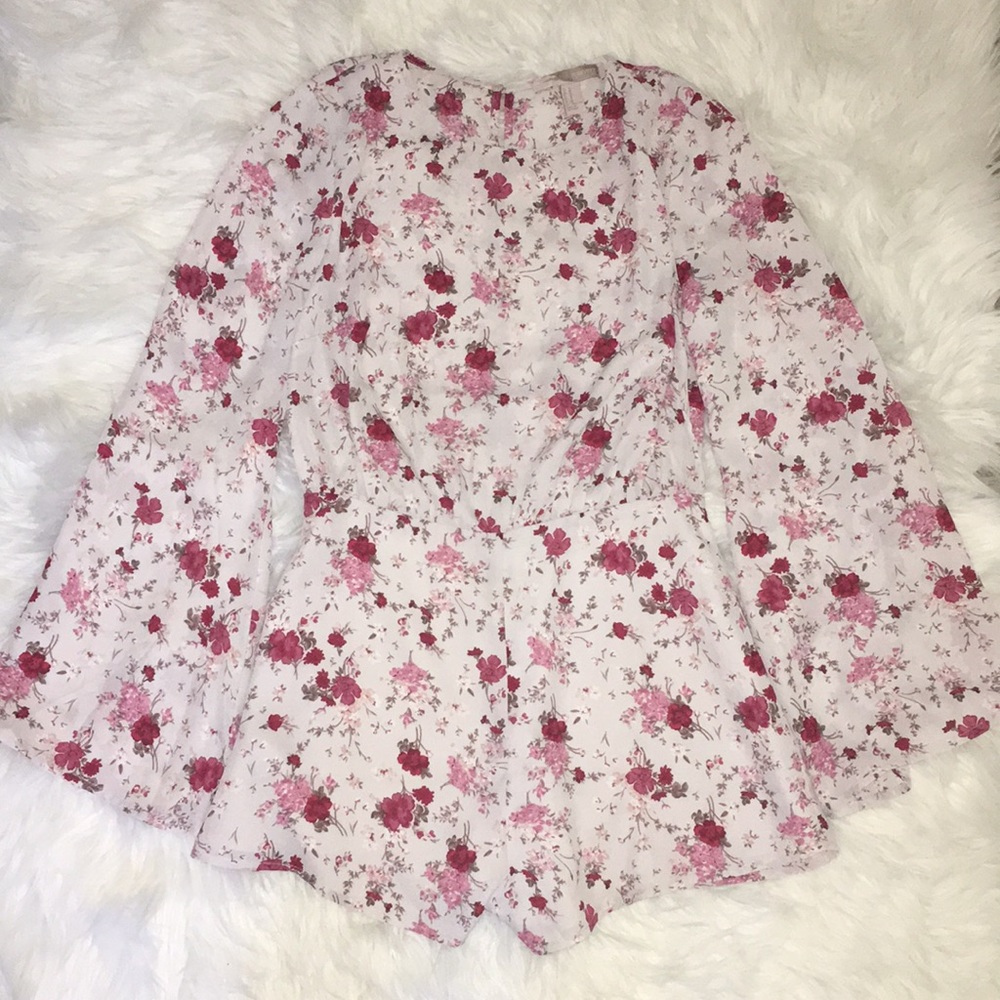 Wide long sleeve romper size M